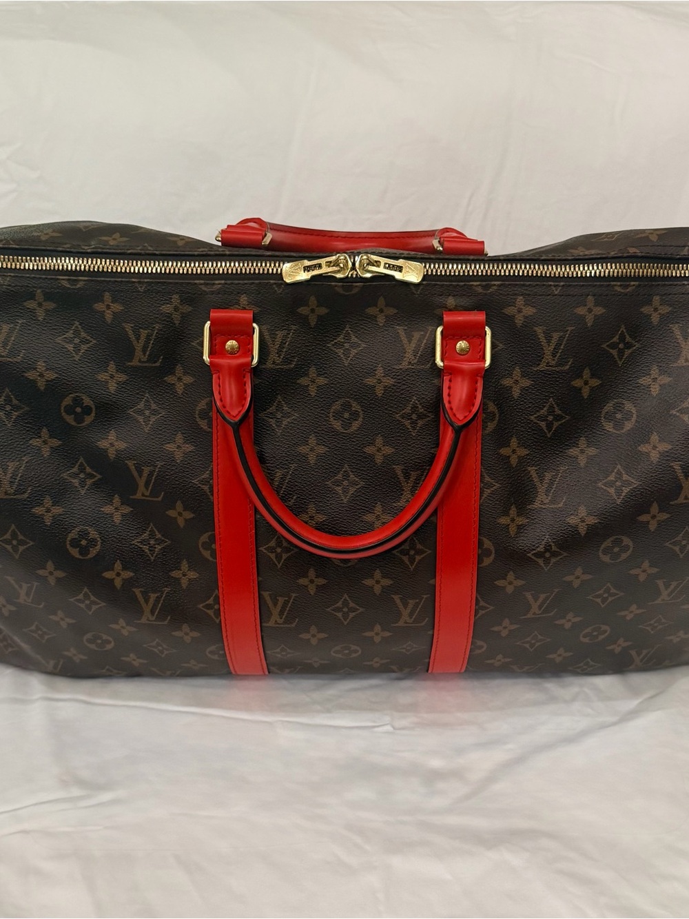 Louis Vuitton Monogram Travel Bag with Red Leather Trim
